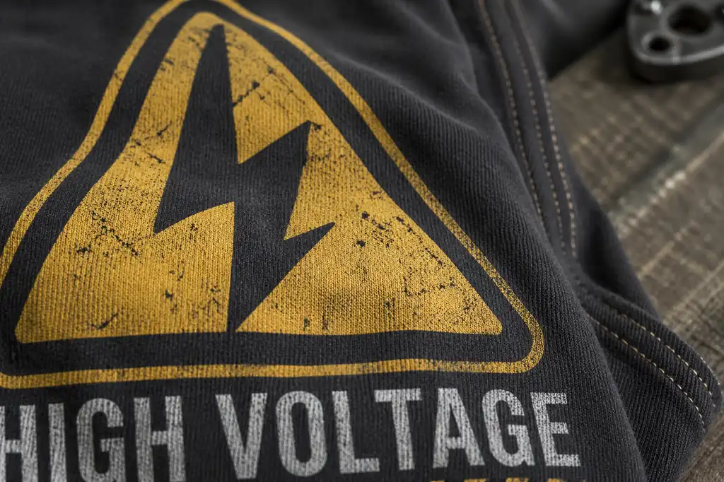 electrical hazard graphic detail on high voltage inspired shirt